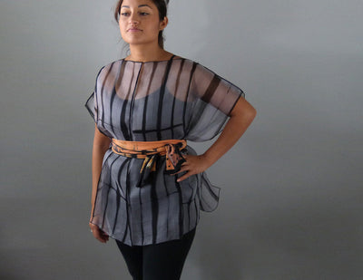 Eight panel silk shirt belted with scarf